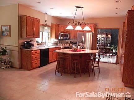 Kitchen
						:
						Granite, large island, updated appliances and lighting, reverse osmosis. 