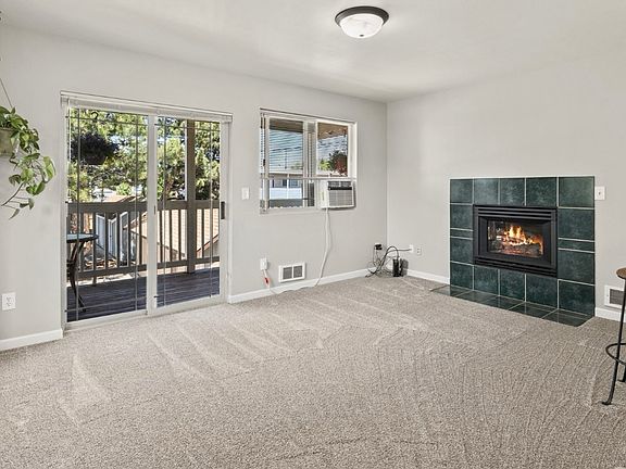 Cozy gas fireplace for winter days, plus a balcony for summer breezes.