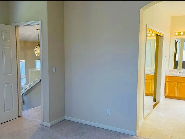 View from the master bedroom to bathroom and entrance
