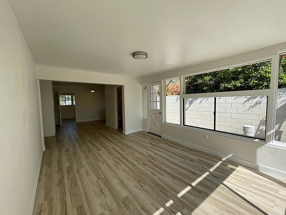 East unit living area, opens to kitchen area.