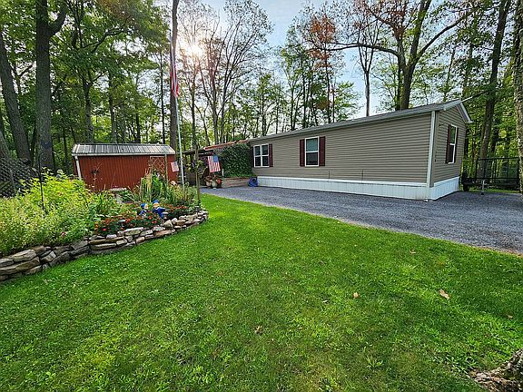 Front porch&sheds from yard