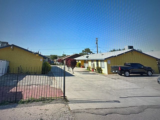 Front view of apartment four plex.
