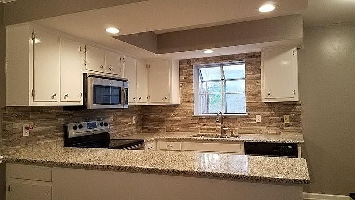 Updated kitchen with granite counter tops