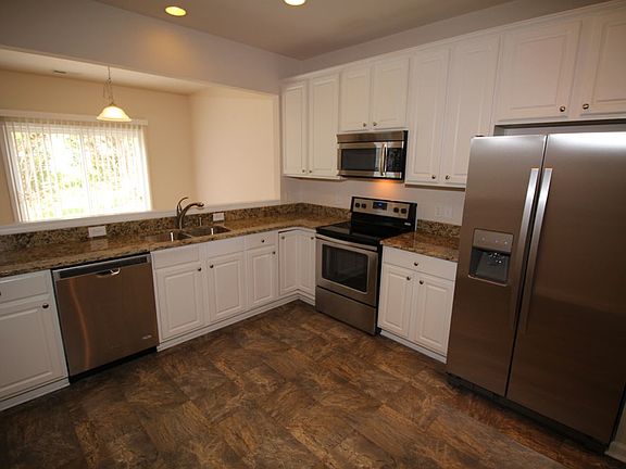Kitchen with NEW stainless steel appliances, granite counter