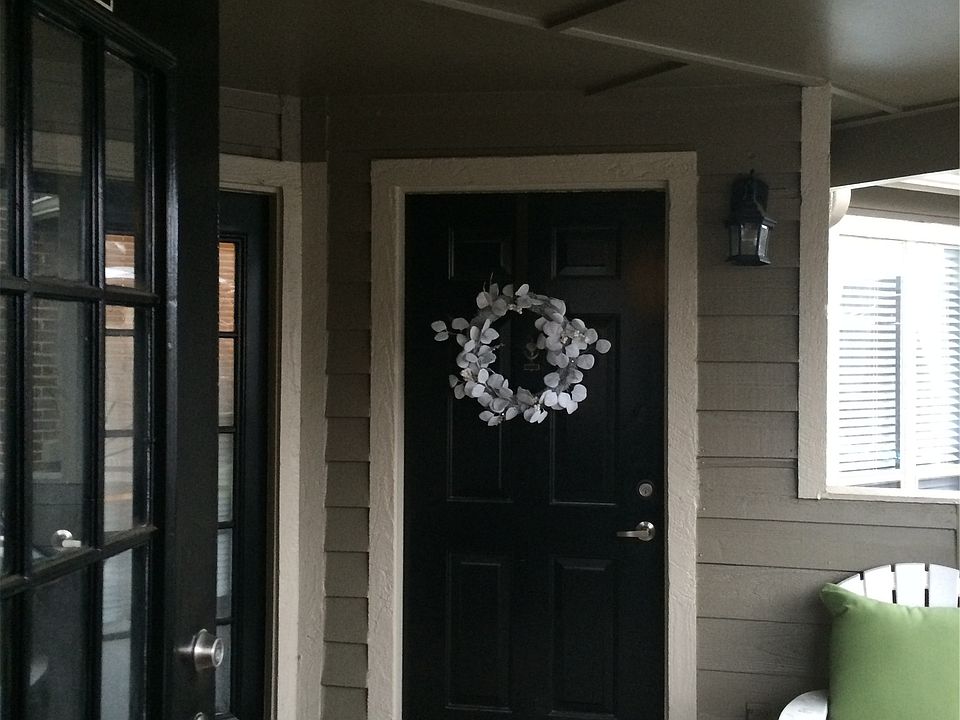 Garden style patio leads to the front door