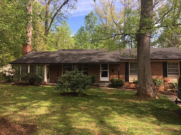 Sunroom with entry from front porch