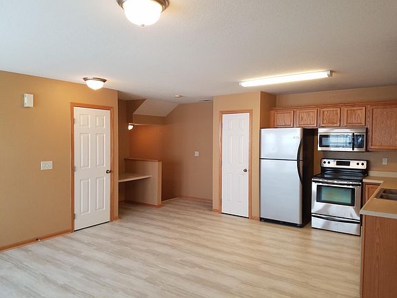 Stainless steel appliances including dishwasher.