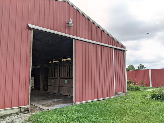 Barn A with 3 finished horse stalls and room for 3 additional stalls