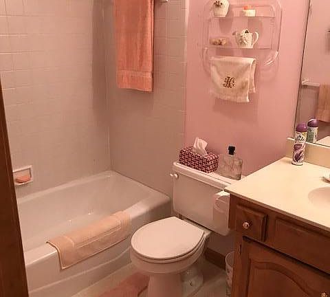 Hall bath with tub and shower