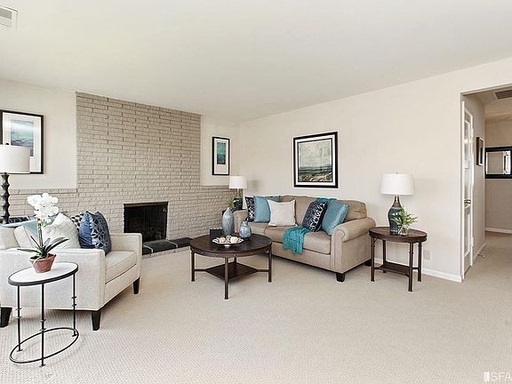 Living room area with fireplace