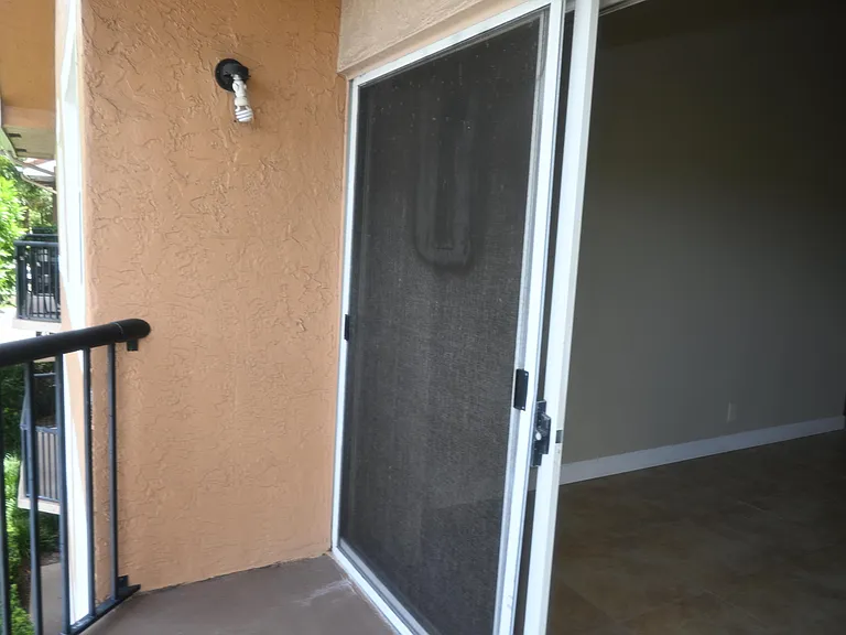 8721 Wiles Rd #305 — Photo 21