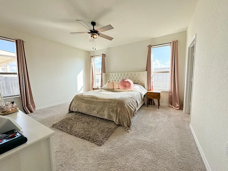 Enormous owner's suite currently pictured with a king size bed
