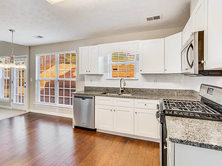 Open concept kitchen to breakfast and family room