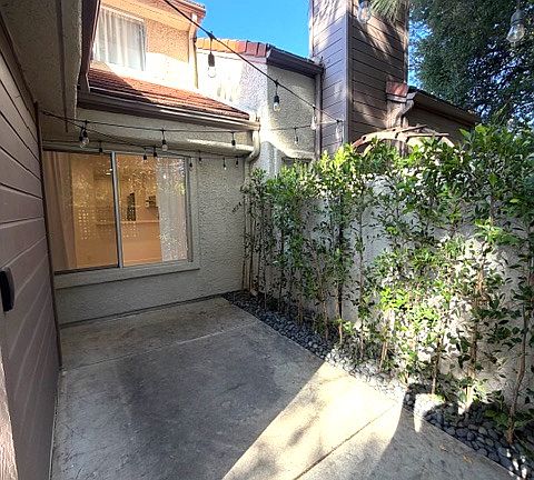 Front patio space enclosed by gate