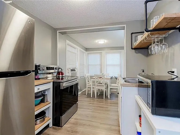 4625 Harrison St #TOPFLOOR — Photo 1