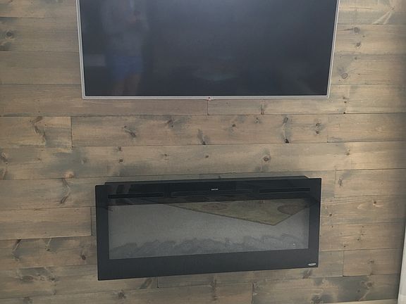 Shiplap wall & fireplace in 