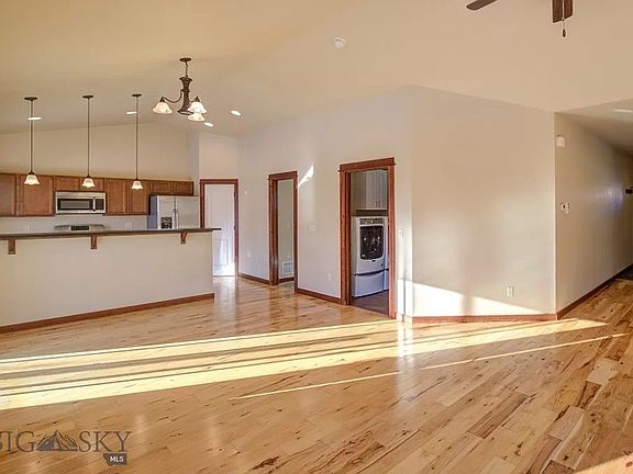 Great Room and open floor plan into the kitchen and dining.