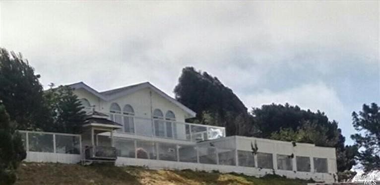 Designed to enjoy the remarkable view from sheltered patio, secret garden, sun trap, family room, ki