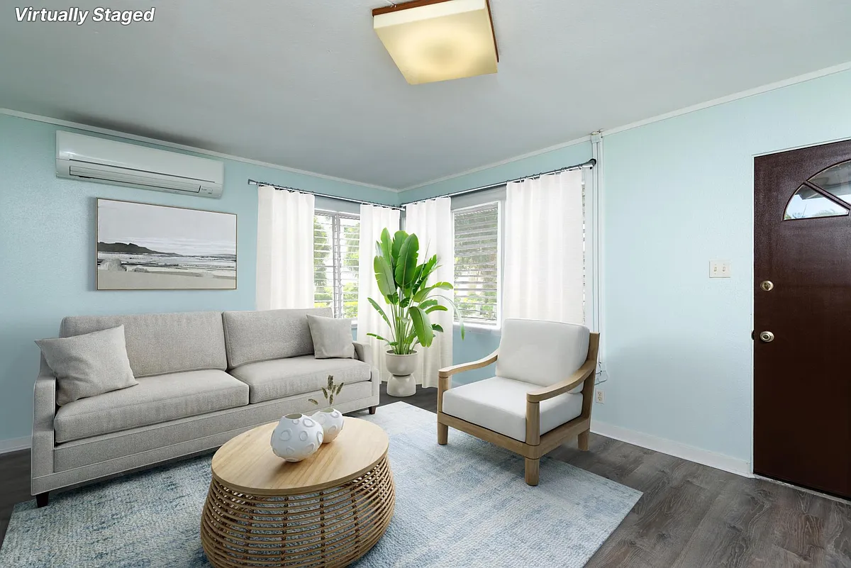 Spacious living room with many louvers for natural light and breeze. - 427 Olomana St