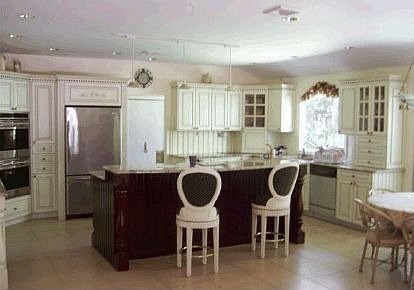 New kitchen with granite, stainless, cooking/eating island, two huge pantries