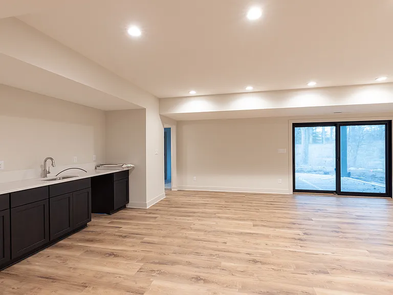 Family room. Wet bar. Walk out access to covered patio and back yard.