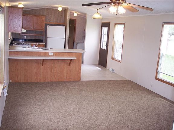 7335 Eaton Rapids Rd. Living Rooom and Kitchen