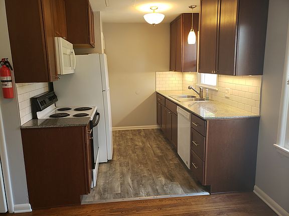 Recently renovated kitchen with newer appliances. Pantry on the left.