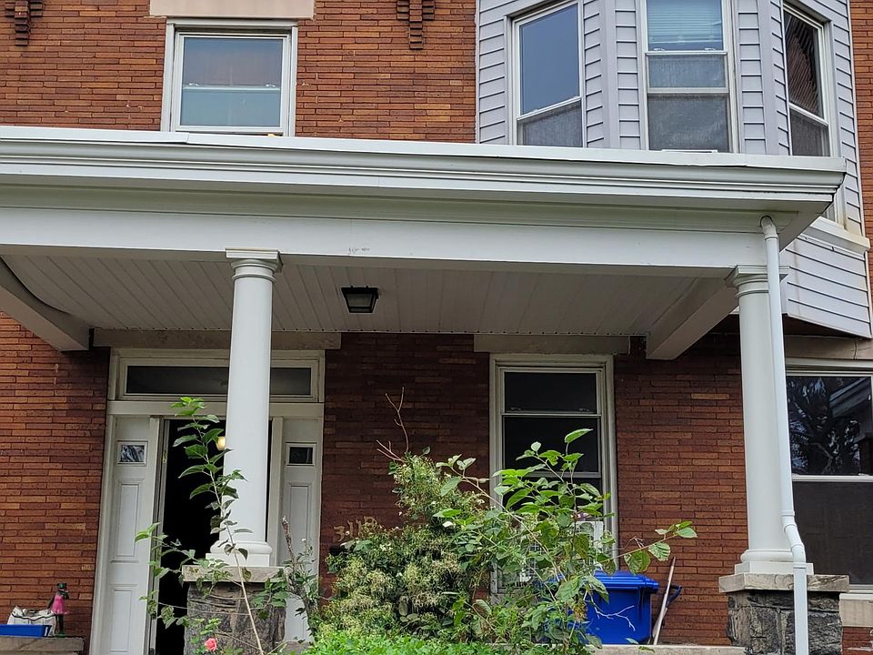 Front View of the House. Fenced Yard