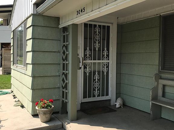 Front entry with security door.