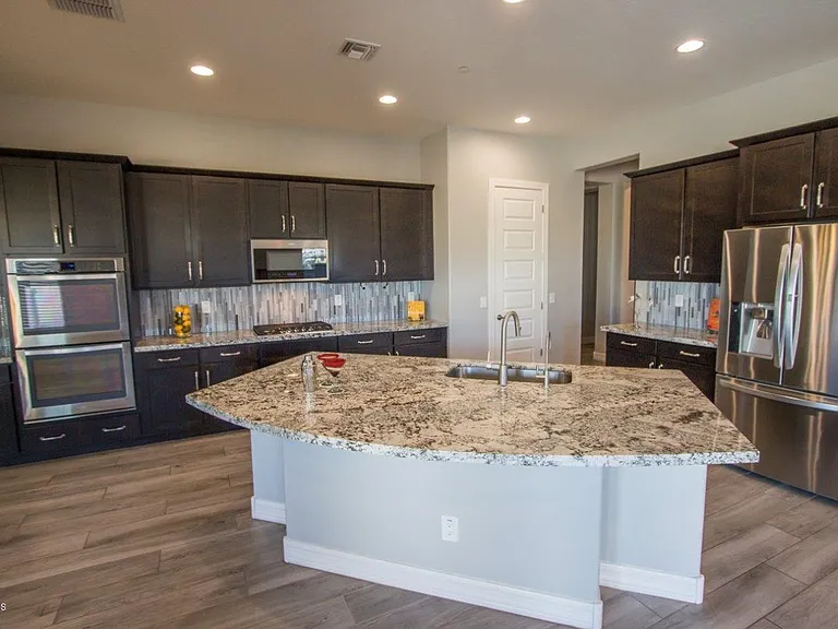 9775 W Rowel Rd — Photo 7
