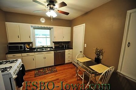 Kitchen- pantry in front corner and back door that leads to basement and porch