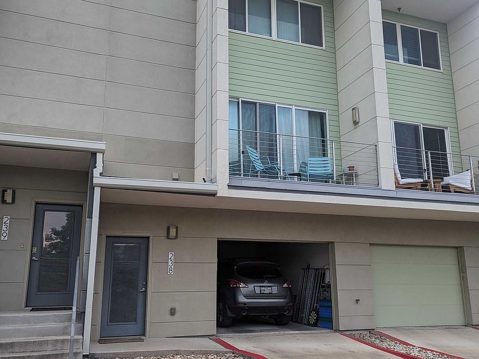 The outside of the unit with 1-car garage!