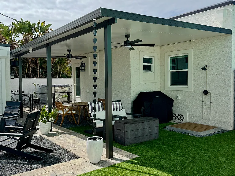 Picture coming soon with outdoor couch and a dining table that seats six.