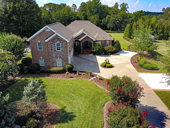 1 1/2 Acre lot. Front entrance Full Brick 2 year old roof