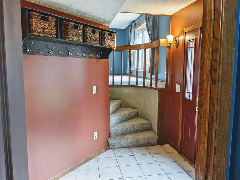 Front entry stairs to living room 2