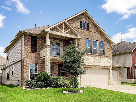 There is a upgraded full yard sprinkler system with smart controller that covers the entire lawn. There are two covered areas in the front of the home.