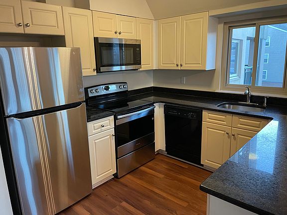 Kitchen with granite countertops and new appliances
