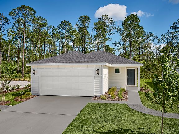 The Acadia floorplan exterior modeled at Flagler Village.