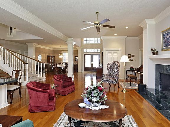  Another view from the living area showing the fluted columns, double crown-molding and open design elements.
