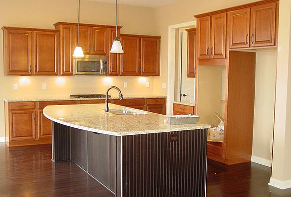 The Pembroke D with hardwood floors and large island