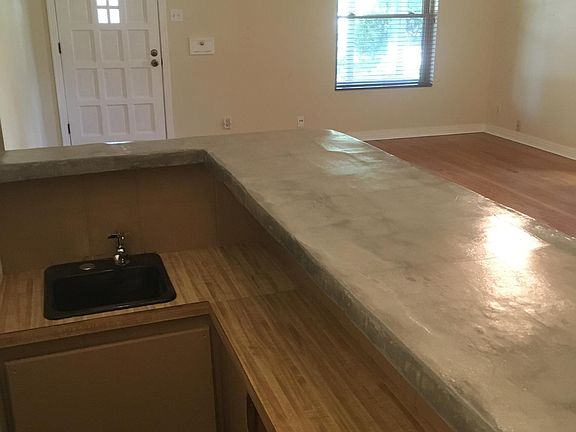 Wet bar with hand shorne cement top