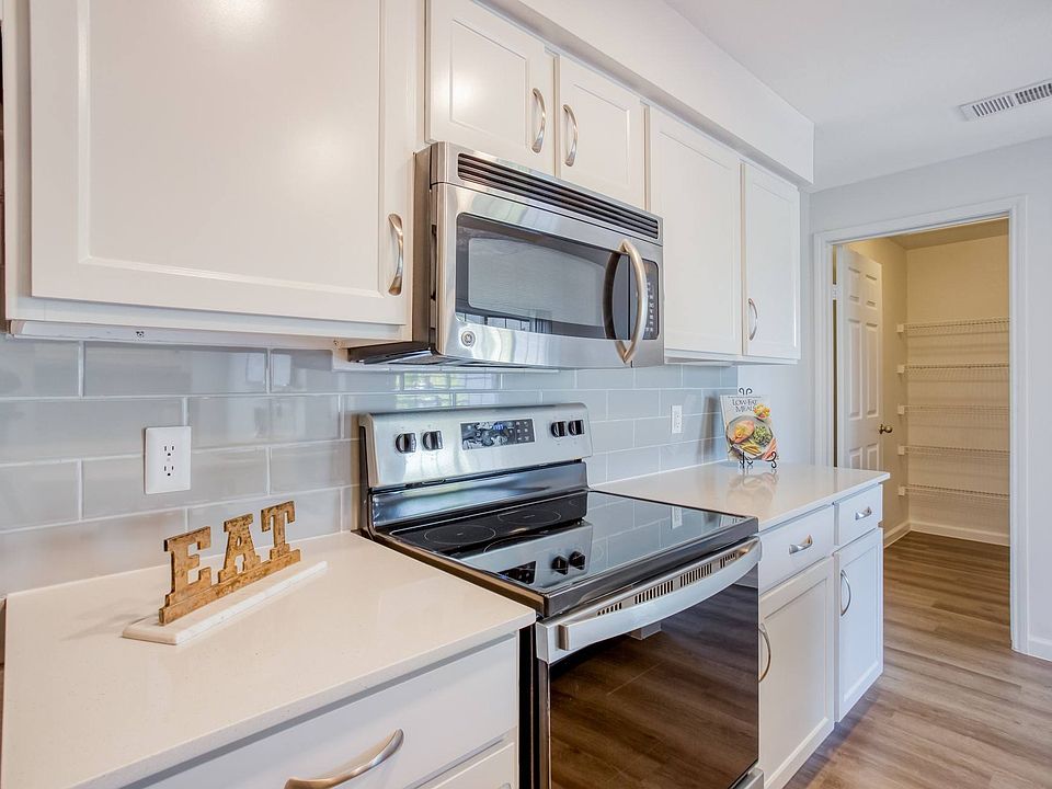 State of the art stainless steel appliances and custom cabinetry