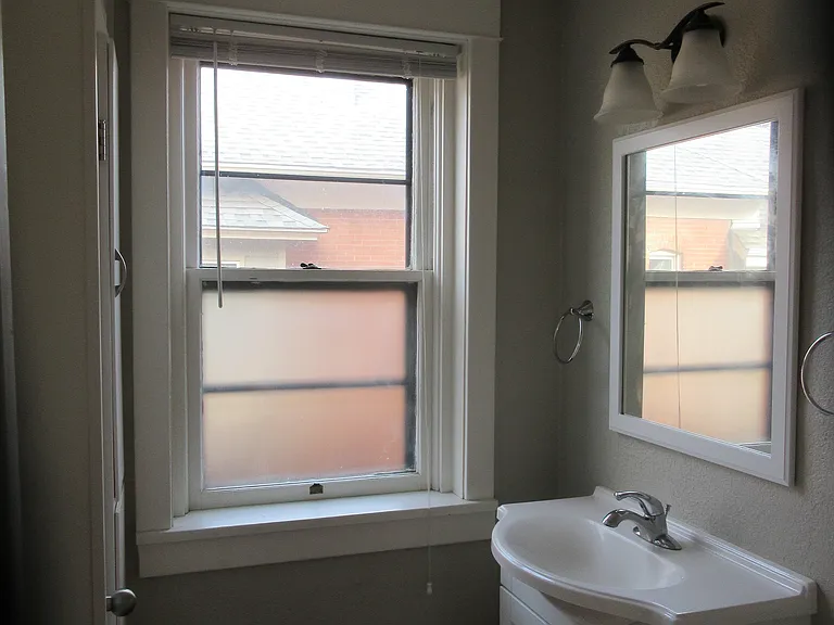 1033 S Clarkson St — Photo 3