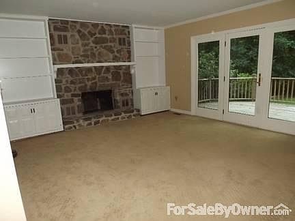 Wood Burning Fire Place
						:
						A stunning floor to ceiling stone fireplace surrounded by custom built-ins.