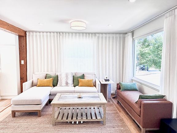 Bright spacious living room with brand new furniture.