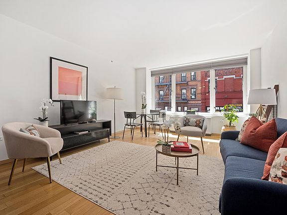 2nd image of 311 E 11th St #Penthouse 2b