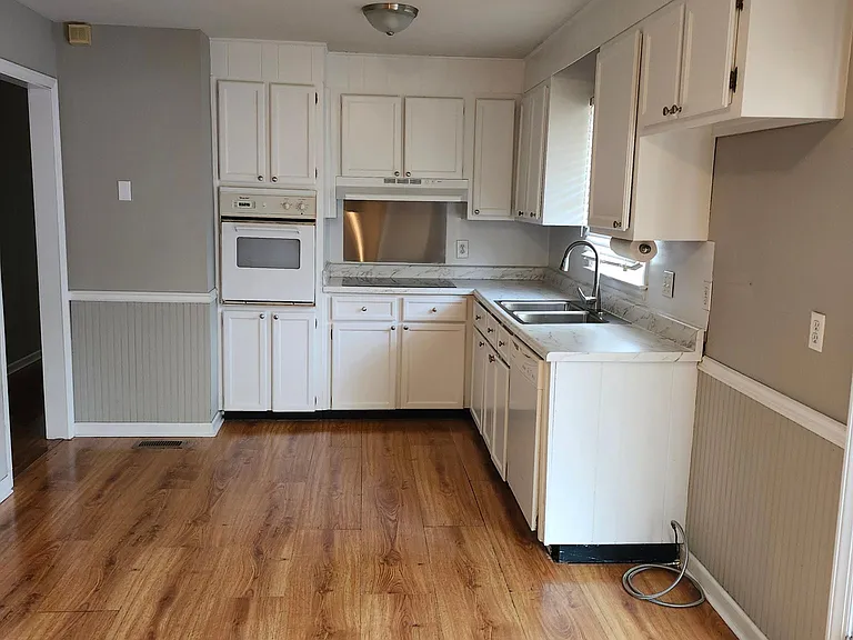 Kitchen: View showing appliances and large kitchen & dining areas; Must furnish own refrigerator!