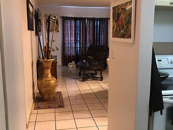 Hallway/entrance, kitchen to the right , bedroom with walk-in closet, bathroom, and linen closet would be to the left
