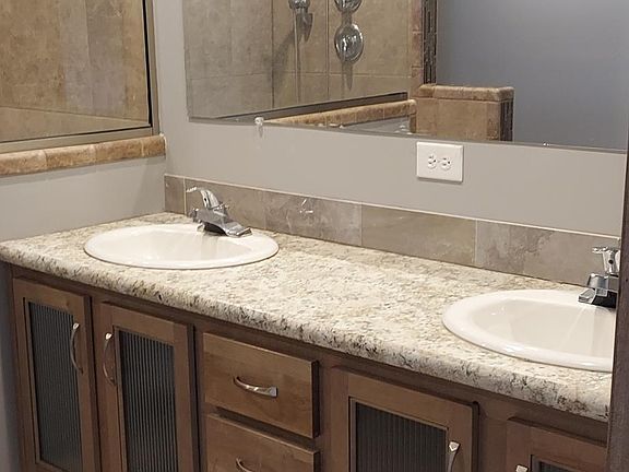 dual vanities with tons of storage in master bath
