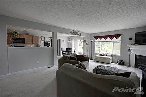 The Great room is the central gathering place of this house. Special features include: decorative gas fireplace with ornate mantel & tile surround, triple view windows and easy access to the kitchen and breakfast room.